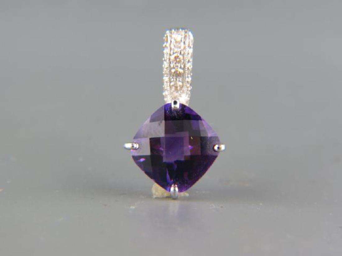Amethyst & Diamond Pendant,: deep rich cushion cut gem with 15 round diamonds above 14k white gold, 7/8" long