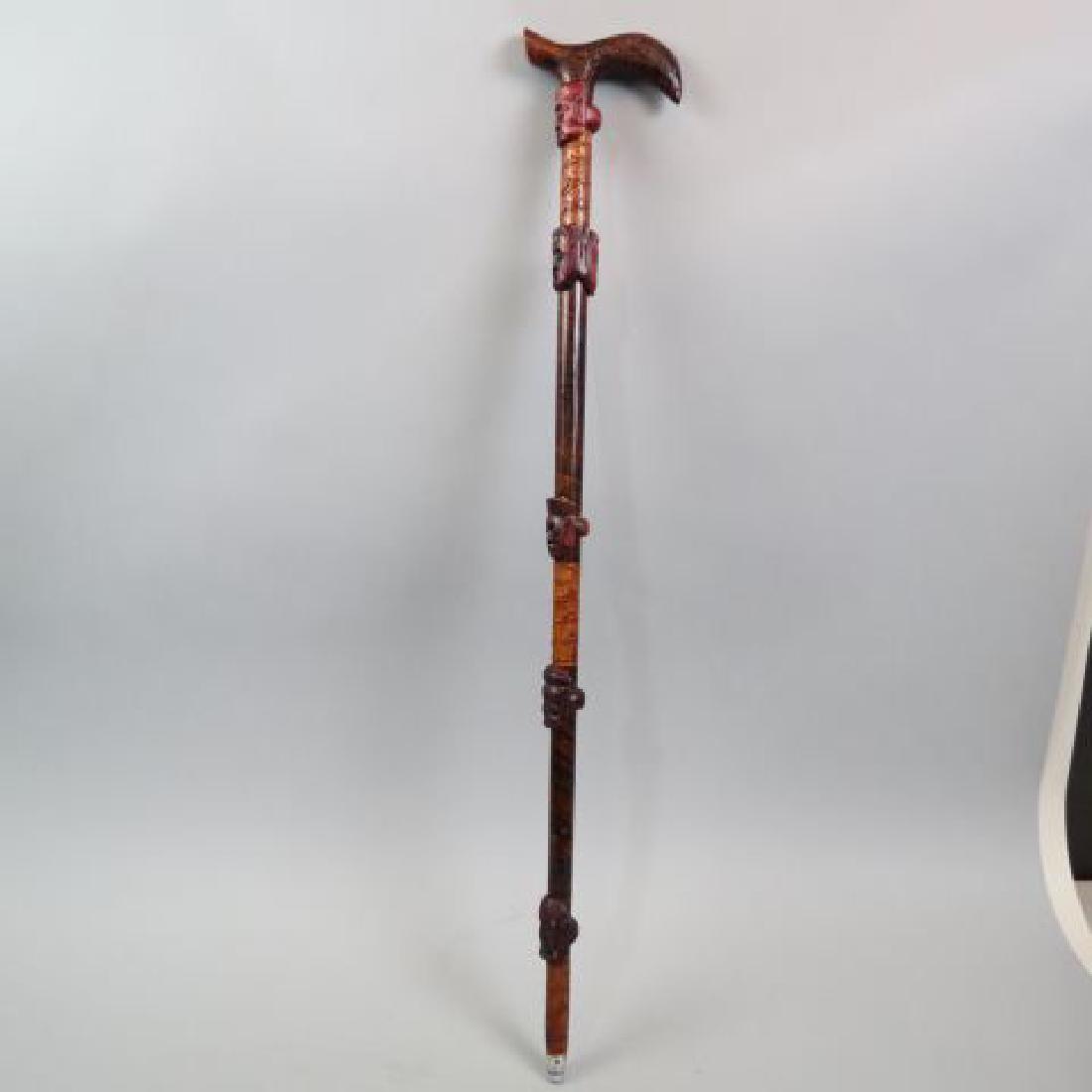 Carved Wooden Sword Cane with Faces & Leaves,: overall 33" long