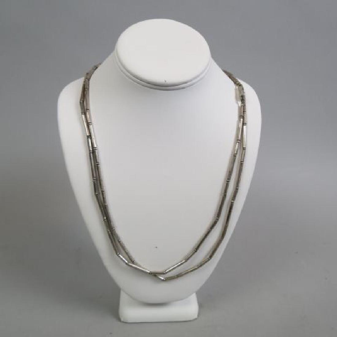 William Spratling Mexican Sterling Necklace,: cylindrical & beaded design, 50" long, famous Taxco silversmith, signed.............Biography from The Columbus Museum of Art, GeorgiaWilliam Spratling was born to an Alabama-bred father and a New Eng