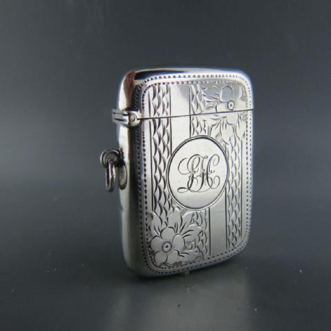 English Sterling Silver Match Safe Edwardian,: hallmarks of Birmingham 1910, by AB Ltd., floral & waves in panel design, watch chain or chatelaine loop, 2" x 1 1/2", monogram LFH, excellent
