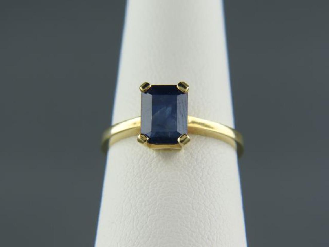 Sapphire 14k Gold Ring,: blue emerald cut sapphire in 14k yellow gold, currently size 6 1/2