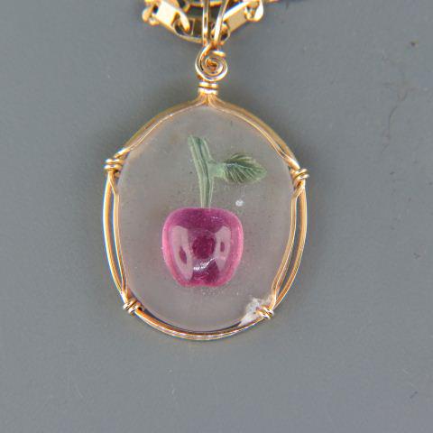 14K Gold & Gemstone Necklace,: carved pink tourmaline, green tourmaline forming an apple on frosted crystal, all 14K yellow gold, 10.3 grams, 21 1/2" long.