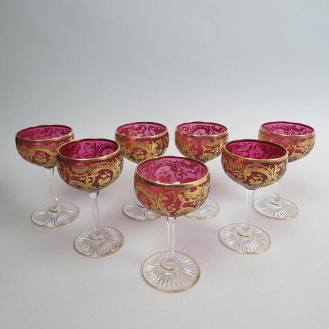 7 French Cameo Art Glass Wines,: gold on ruby glass bowls, clear cut stems, attributed to Val St. Lambert or Baccarat, 4 1/2", excellent.