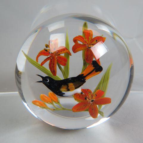 Ronald "Rick" Ayotte Art Glass Paperweight,: Baltimore Oriole with Tiger Lilies, signed and dated 1986, #6 of 50, 2" tall, 3" diameter. Provenance Roslyn Rose, 1986, excellent.