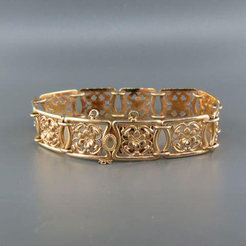 14K Gold Bracelet, Art Deco,: antique carved style floral panels, dated December 25, 1927, 1/2" wide, 27 grams, 7" long.