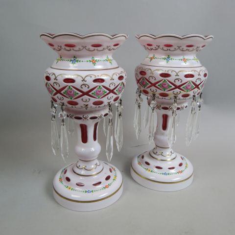 Pair of Bohemian Art Glass Mantle Lusters,: white cut back to cranberry, enameled floral, gold trim, cut crystal prisms, 12 1/2" tall.