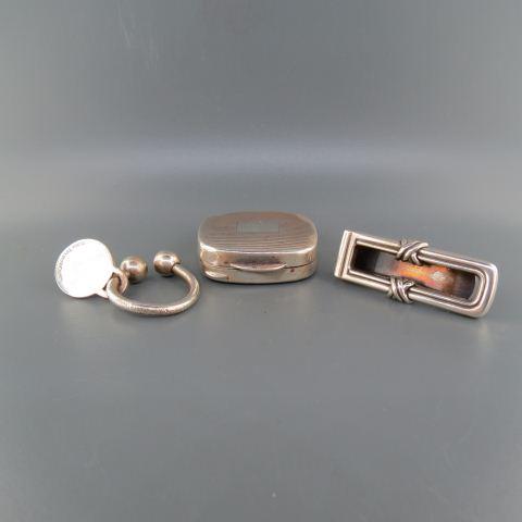 3 Tiffany Sterling Silver Items;: money clip, key ring and pill box, no monograms.