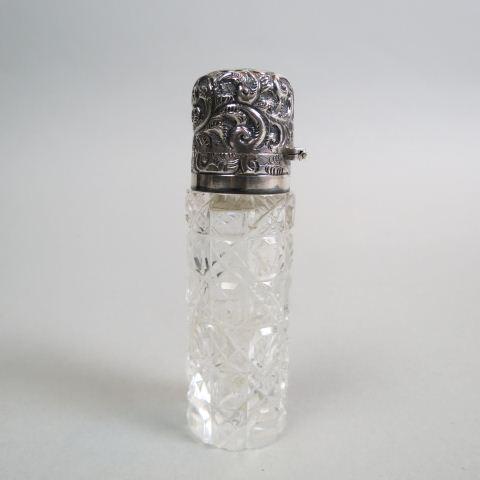 English Sterling & Cut Glass Perfume Bottle,: Daisy & Button style design, cylindrical, hallmarked repousse silver hinged top, inner stopper, 3 1/2" tall.