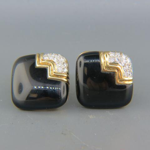 Diamond, Black Onyx 14K Gold Earrings,: each with 11 round diamonds, over .65 carat total, yellow gold, 3/4", 18 grams.