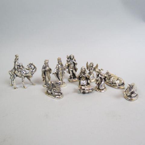 11 pc. Sterling Silver Nativity Set,: with Jesus, Joseph, Mary, three wise men, shepherd, angel, camel and two cows, 3", marked .925, resin filled.