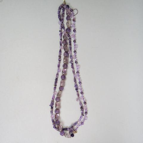 Amethyst Necklace,: double strand, various shapes and coloring, 16" long.