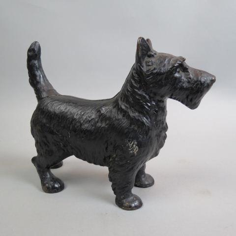 Cast Iron Figural Doorstop of a Scotty Dog,: 11" long, 8 1/2" tall.