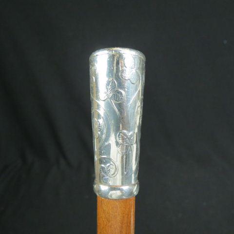 Tiffany Sterling Silver Handled Walking Stick,: engraved shamrock designs, circa 1890, 36" long.
