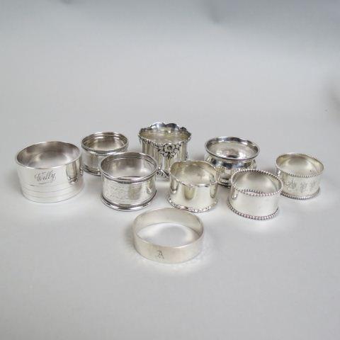 Lot of 9 Napkin Rings,: 5 are sterling, 3 are coin silver (unmarked) and one Art Deco by Christofle.