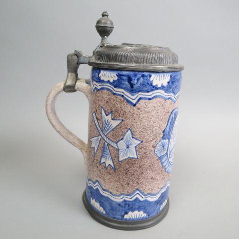Early Delft Style Pottery Stein,: medallion and floral design, pewter lid with medallion, 9 1/2" tall, signed, a nice clean example, probably 18th century.