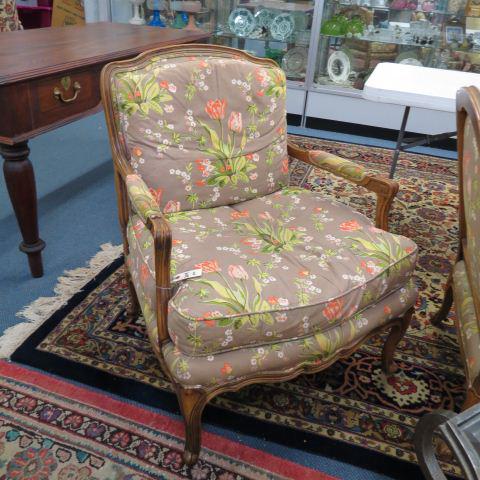 Pair of Baker Bergere Style Arm Chairs,: carved, floral upholstery (nneds replaced).