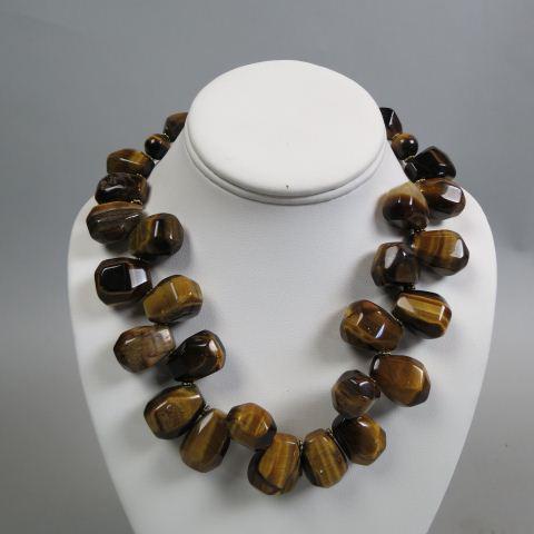 Tigerseye Necklace,: 29 beads, golden spacers and clasp, 17" long.