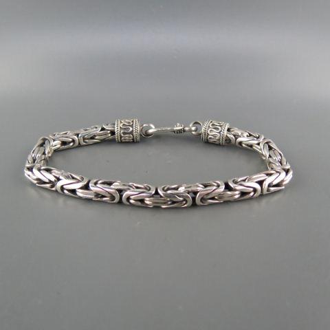 Sterling Silver Bracelet in Byzantine Link,: 5.5 mm, 8" long, 35.3 grams.