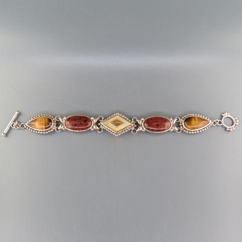 Sterling Silver Gemstone Bracelet,: with tigerseye, abalone and oval brick red stones, toggle clasp, 42.5 grams, 7 1/2" long.