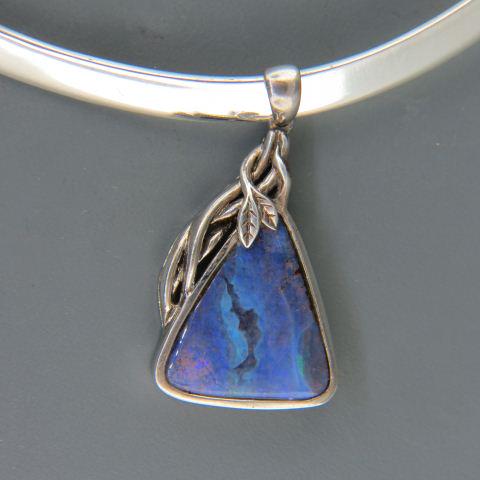 Black Opal & Sterling Silver Necklace,: triangular gem pendant in natural matrix on choker style necklace, 28 grams.