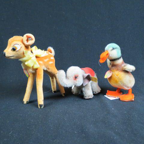 3 Steiff Animals,: "Bambi" (5"), duckling (4 1/2'), and a 1955 elephant for 75th anniversary of Steiff, all excellent, with buttons.