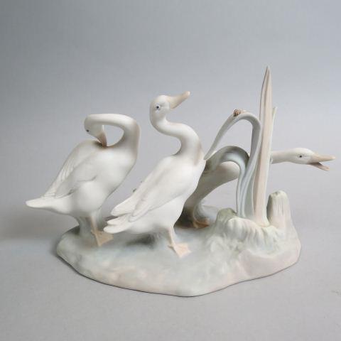 Lladro Porcelain Figurine of Three Geese,: satin finish, 5" tall, 8" long, excellent.