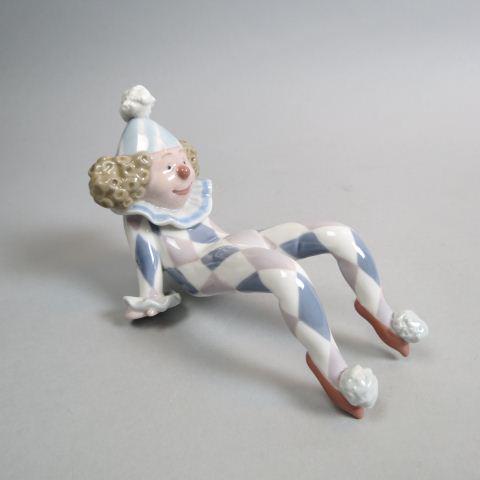 Lladro Porcelain Figurine of a Clown at Rest,: 6" long, 4" tall, excellent.