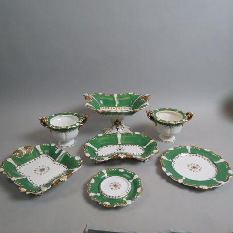 24 pc. English Davenport China Dessert Service,: or Luncheon set, green and gold decoration, mid 19th century, includes 16 plates ( 9"), pair of oval footed dishes ( 7" X 11"), a rectangular dish ( 8" X 10"), two open bowls with underplates and a la