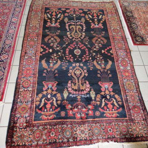 Ferrahan Sarouk Type Persian Handmade Rug: antique, urns and florals on indigo field, floral borders, 4'1" x 6'8"