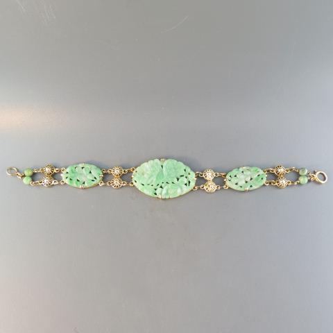 Chinese Carved Jade & 14K Gold Bracelet,: floral design ovals plus beads, 15 grams, 6 1/2" long.
