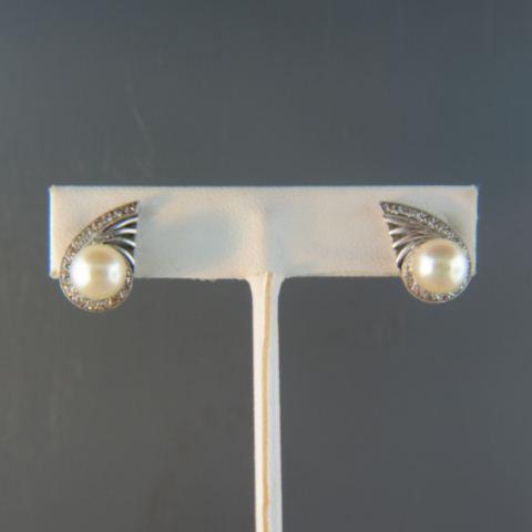 Diamond & Pearl Earrings in 14K White Gold,: each with 15 round diamonds swirling around a lustrous 8mm pearl, approx .50 carat of diamonds pierced clips, 6.1 grams, 3/4" long, Art Deco style.