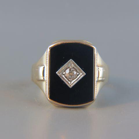 Diamond & Black Onyx Man's Ring,: 10K yellow gold, .20 carat diamond set in black onyx, Art Deco era, 5.8 grams, currently size 11.