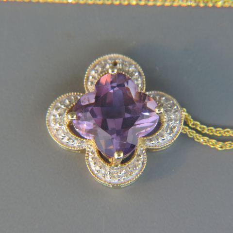 Amethyst & Diamond 14K Gold Pendant & Chain,: four leaf clover shape, fancy cut gem, 5/8" pendant on 18" chain, 5.2 grams.