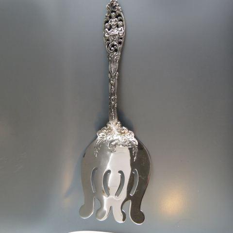 Dominick & Haff Sterling Asparagus Server,: Labors of Cupid pattern, a trio of cherubs at the table, fancy designs including lobster on end, 9 3/4" long, 191 grams, no monogram, excellent.