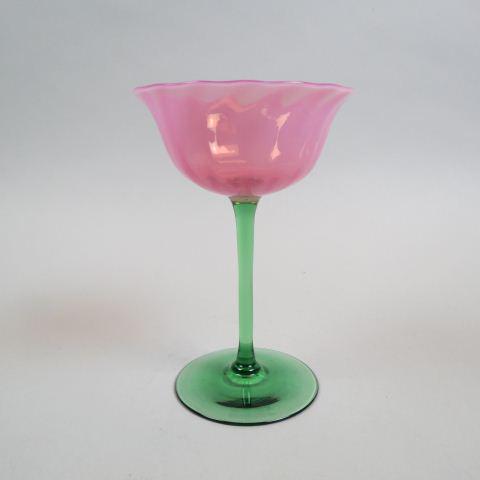 Steuben Art Glass Oriental Poppy Champagne Glass,: 6 1/4" tall, signed, excellent.....Steuben Glass is one of America’s most cherished producers of collectible crystal. Whether it is a Steuben vase, bowl, figurine, or sculpture, Steuben pieces are a