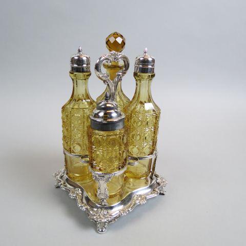 Victorian Golden Amber & Silverplate Castor Set,: center handled, footed, 4 daisy & button style castors.