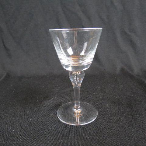 12 Steuben Crystal Wine Glasses,: hollow teardrop in stems, 5 1/2", signed, excellent, with cloth holders, in original box....Steuben Glass is one of America’s most cherished producers of collectible crystal. Whether it is a Steuben