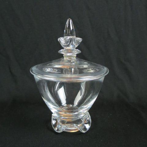 Steuben Crystal Covered Jar,: fancy wave design base, wave & knob handle, 6 3/4" diameter, 10" tall, signed, excellent....Steuben Glass is one of America’s most cherished producers of collectible crystal. Whether it is a Steuben