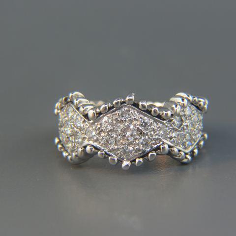 Diamond Eternity Band Ring,: 36 round diamonds totaling over .75 carat in 14K white gold, high grade with appraisal of 2,100.00, size 5 1/4.