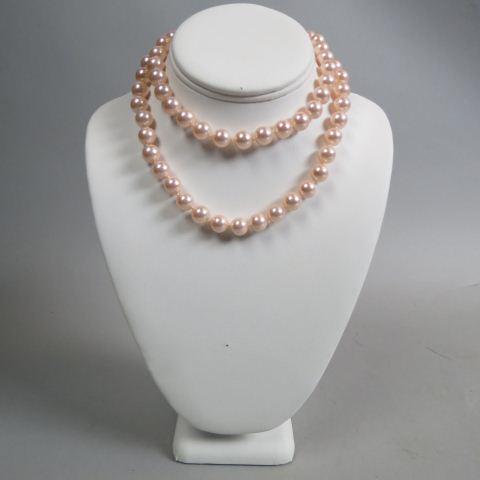 Pearl Necklace,: 65 lustrous pink rose pearls, 9.5 mm, 30" long, sterling clasp.