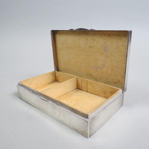 1936 English Sterling Silver Box,: linear design, 3 1/4" x 6", 1 1/4" deep, wood linded, hallmarks of Birmingham, maker D. Brothers, no monogram.