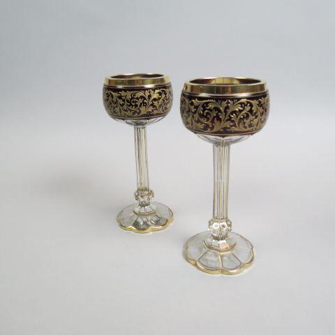 Pair of Moser Bohemian Art Glass Wine Goblets,: hock shape deep ruby tops with elaborate goldwork, floraform panel cut & floral base, 7 5/8", unsigned, excellent.