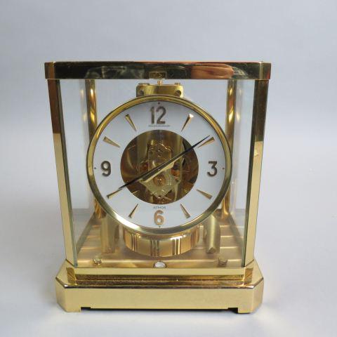 Jaeger LeCoultre "Atmos" Clock,: drop front glass door, classic atmospheric clock, 9 1/2" tall, working.............What inspiration led the Jaeger‑LeCoultre watchmakers to dream up the Atmos clock in 1928? How did they think t