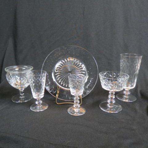 54 pc. Cut Crystal Stemware Service: diamond, marquise, and thumbprint design, 12-6.75" iced beverage, 12-8.5" plates, 12-4 & 5/8" champagnes or sherbets, 6- 4 5/8" small wines, 6-4 7/8" juice, 6-4.75" shrimp cocktails with inserts, exce