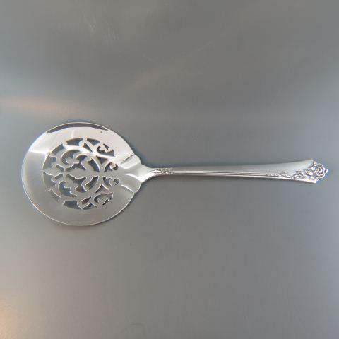 Oneida "Damask Rose" Sterling Tomato Server,: fancy openwork, circa 1946, 8" long, 59 grams, no monogram, excellent.
