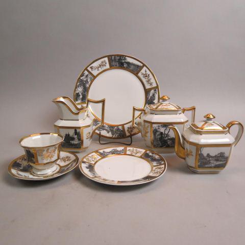 Limoges Porcelain Dessert and Tea Service: black and white scenic panels with gold trim, includes tea pot, creamer, sugar, individual teapot, 8-7" plates, 7 cups, 8 saucers, and two 9" cake plates, circa 1890, excellent