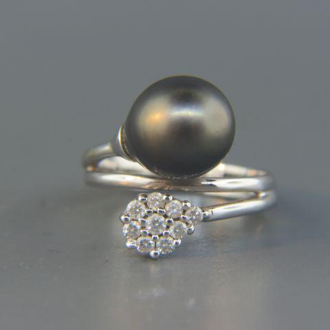 Diamond & Black Pearl Ring by Damiani,: Ninfea with 9 round diamonds totaling .27 carat, 10 mm pearl, 18K white gold, 6 grams, retails at 3290.00, currently size 6 1/4.