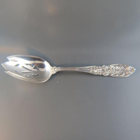 International "Richelieu" Sterling Serving Spoon,: pierced and slotted with an elaborate 1935 pattern, 8 1/2" long, 80 grams, no monogram, excellent.