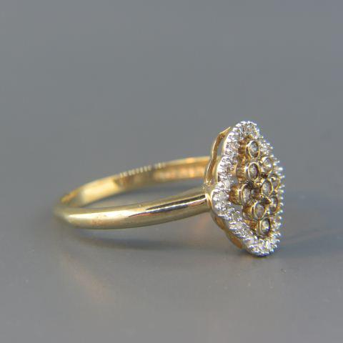 Diamond & 14K Gold Ring,: fancy yellow, brown, and white diamonds totaling .50 carat in 14K yellow gold, currently size 9.