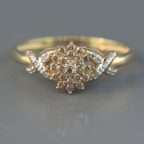 Diamond Ring,: fancy yellow, brown, and white diamonds totaling .50 carat in 14K yellow gold, currently size 9.